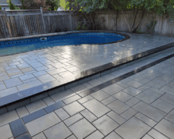Interlock pool deck with step